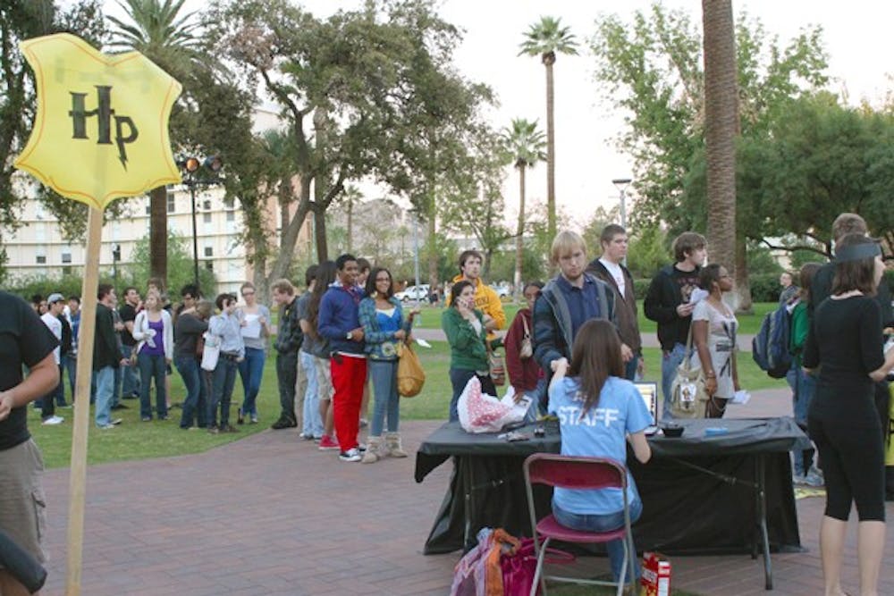 CRAZY MUGGLES: Students line up last November to print out their premier showing tickets for “Harry Potter and the Deathly Hallows: Part 1.” Die-hard fans from around the world are already lining up for “Harry Potter and the Deathly Hallows: Part 2,” the highly anticipated and final installment of the Harry Potter saga that is set to release on Friday at midnight. (Photo by Rosie Gochnour)