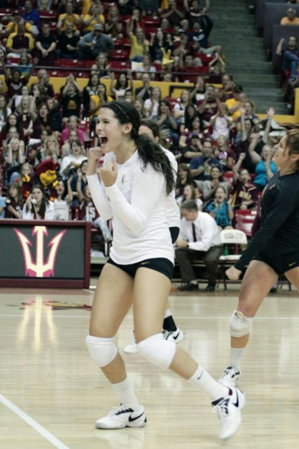 LOVE FOR THE GAME: ASU sophomore outside hitter Danica Mendivil celebrates after a point during a match. The 2010 Pac-10 All-Freshman Honorable Mention inductee said she enjoys the intensity and competition as a member of the Sun Devil volleyball team. (Photo by Beth Easterbrook)