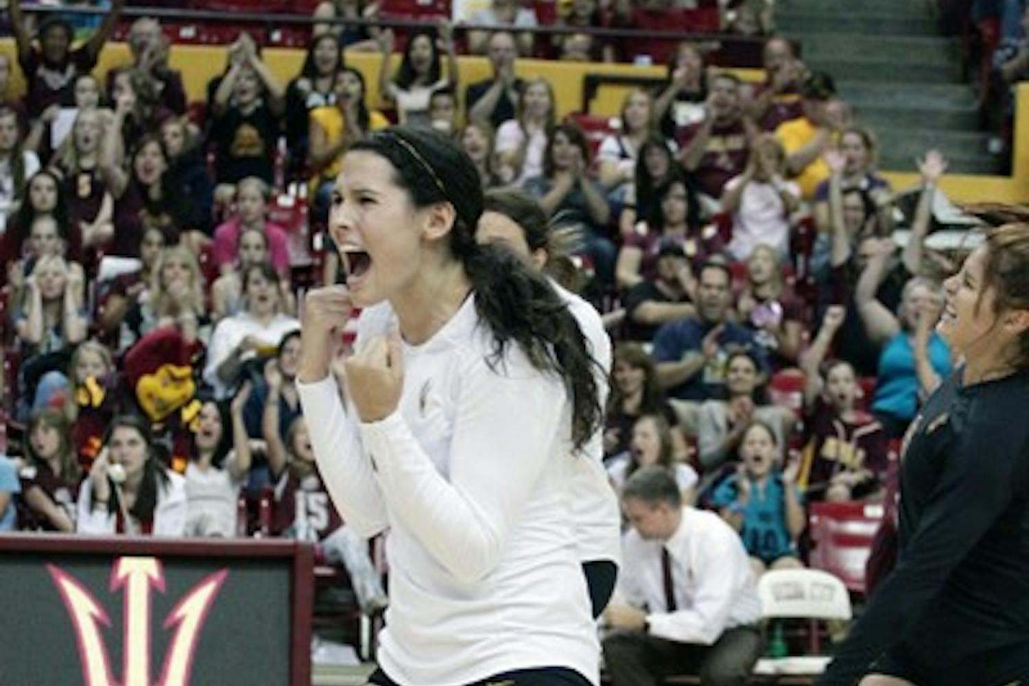 LOVE FOR THE GAME: ASU sophomore outside hitter Danica Mendivil celebrates after a point during a match. The 2010 Pac-10 All-Freshman Honorable Mention inductee said she enjoys the intensity and competition as a member of the Sun Devil volleyball team. (Photo by Beth Easterbrook)