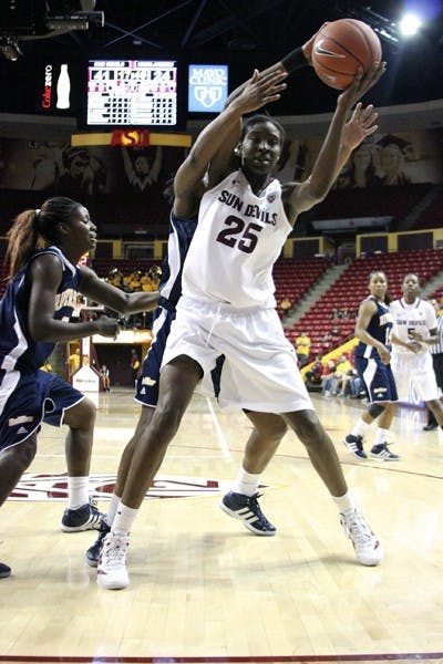 ASU guard/forward Kimberly Brandon raises the ball away from a UC Riverside defender during the Sun Devils’ 66-46 win over the Highlanders on Nov. 11. The Sun Devils remain undefeated at 3-0 after knocking off Boston College on Sunday. (Photo by Samuel Rosenbaum)
