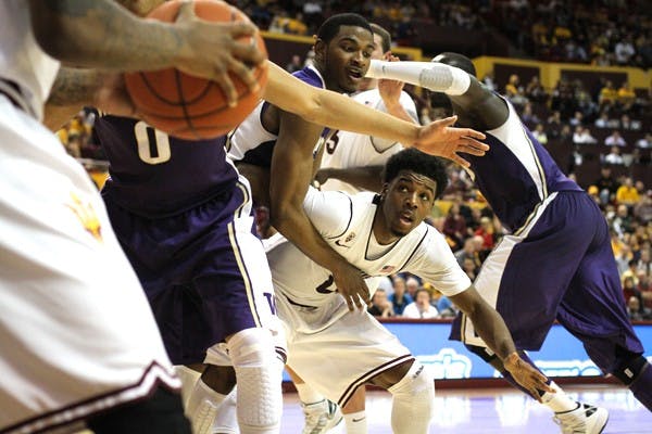 Senior wing Carrick Felix fights to get open during an inbound pass against Washington on Feb. 23. ASU's loss to the Huskies was a setback for ASU's tournament hopes. (Photo by Sam Rosenbaum)