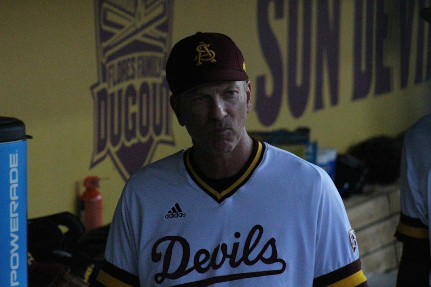 Head Coach Tracy Smith walks in the dugout during a baseball game against the Arizona Wildcats&nbsp;at Phoenix Municipal Stadium in Phoenix, Arizona on Saturday, May 20, 2017. ASU lost 5-9