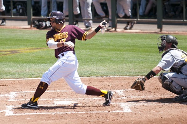 Freshman infielder Drew Stankiewicz whips his body around to finish a swing against Valparaiso on April 21, 2013. Stankiewicz's single up the middle was the game-winning hit for the Sun Devils over Utah on April 26, 2013. (Photo by Molly J. Smith)
