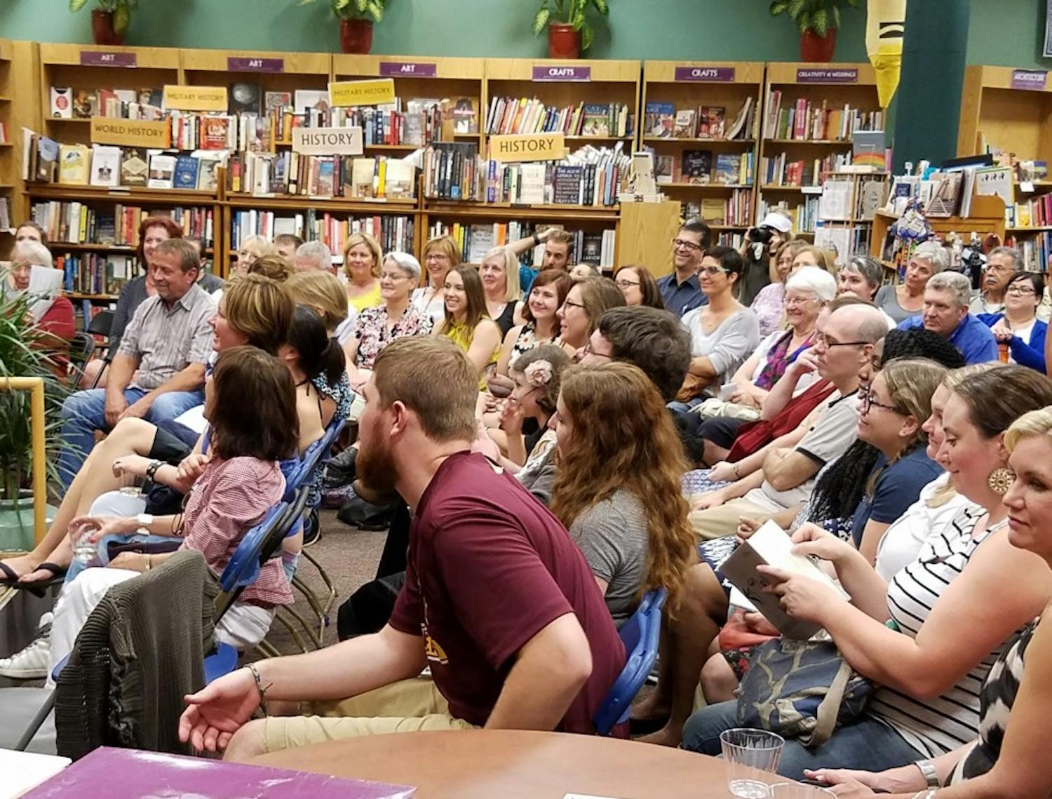 Audience members listening to a poetry reading at Changing Hands Bookstore on Sept. 1, 2016. Rosemarie Dombrowski will be reading her poetry at Changing Hands Bookstore on Dec. 2, 2016.