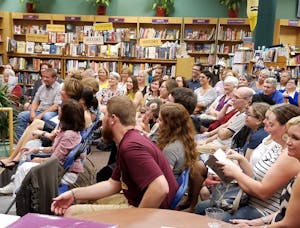 Audience members listening to a poetry reading at Changing Hands Bookstore on Sept. 1, 2016. Rosemarie Dombrowski will be reading her poetry at Changing Hands Bookstore on Dec. 2, 2016.