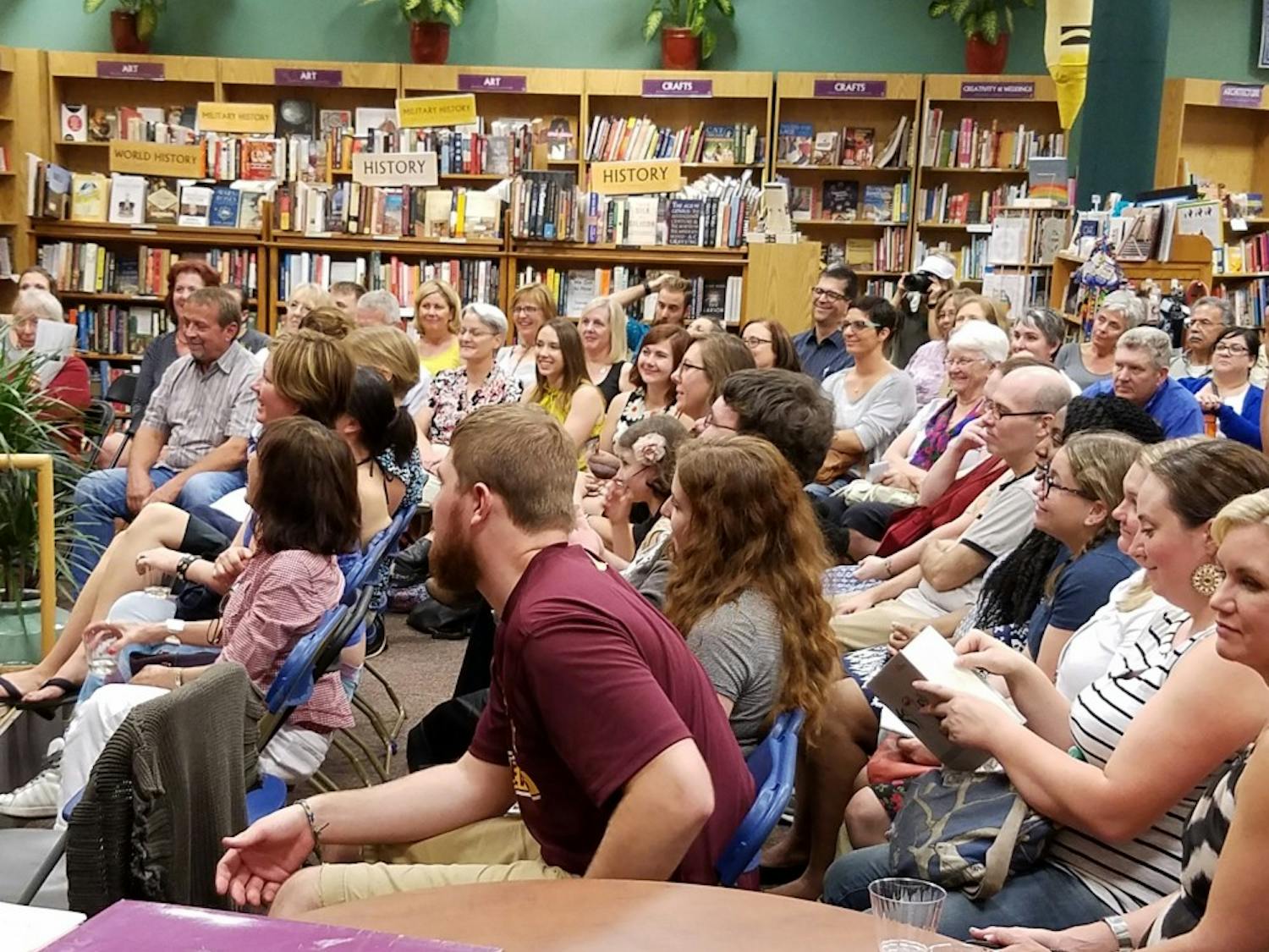 Audience members listening to a poetry reading at Changing Hands Bookstore on Sept. 1, 2016. Rosemarie Dombrowski will be reading her poetry at Changing Hands Bookstore on Dec. 2, 2016.