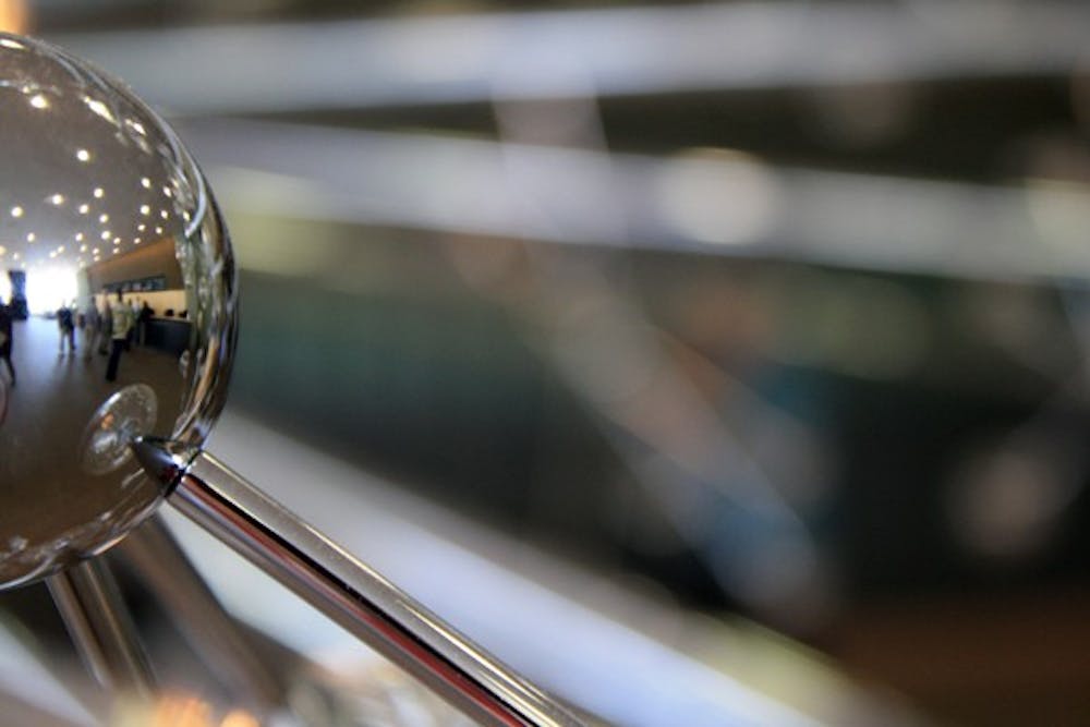 A sculpture attracts an audience in the entryway of the Phoenix Art Museum on Central Avenue in downtown Phoenix Monday. (Photo by Jessie Wardarski)