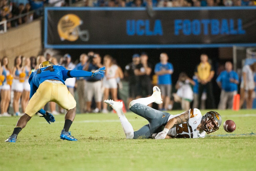 Redshirt senior safety Jordan Simone (38) attempts to make an interception against UCLA on Saturday, Oct. 3, 2015, at Rose Bowl Stadium in Pasadena, Calif. The Sun Devils defeated the Bruins 38-23.