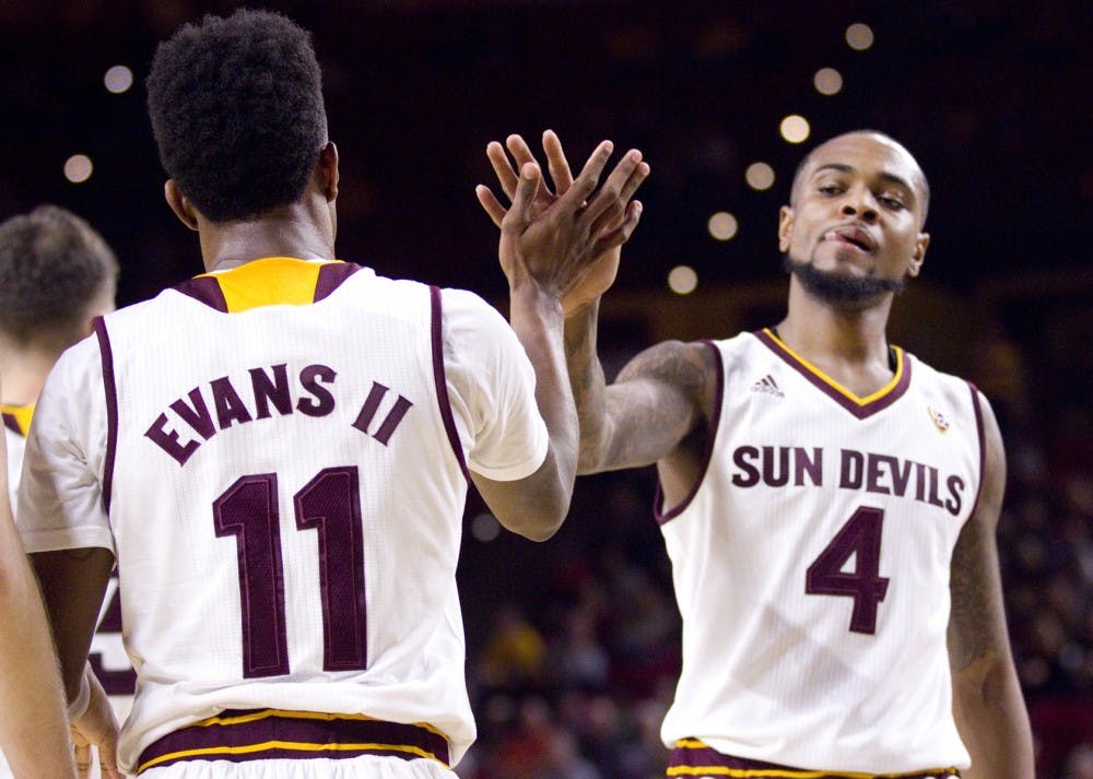 ASU junior guard Shannon Evans II (11) high-fives senior guard Torian Graham (4) after a play in the first half of a men's basketball game against the UNLV Runnin' Rebels in Wells Fargo Arena in Tempe, Arizona, on Saturday, Dec. 3, 2016. ASU won 97-73, putting them at 5-3 on the season.