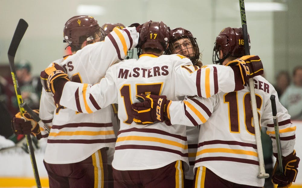 ASU celebrates after scoring a goal against Ohio on Saturday, Jan. 23, 2016, at Oceanside Ice Arena in Tempe. The Sun Devils defeated the Bobcats 6-1.