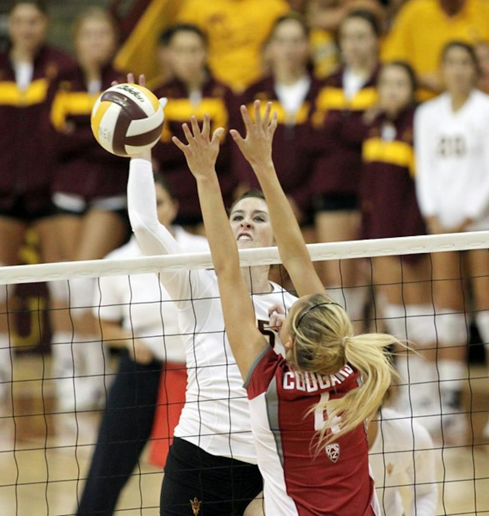 IMPACT: Sophomore middle blocker Alexis Pinson reaches for a spike during the Sun Devils’ 3-2 loss to Washington State on Friday. Pinson has emerged as a valuable “Seventh Man” for the ASU volleyball team this season. (Photo by Rosie Gochnour)