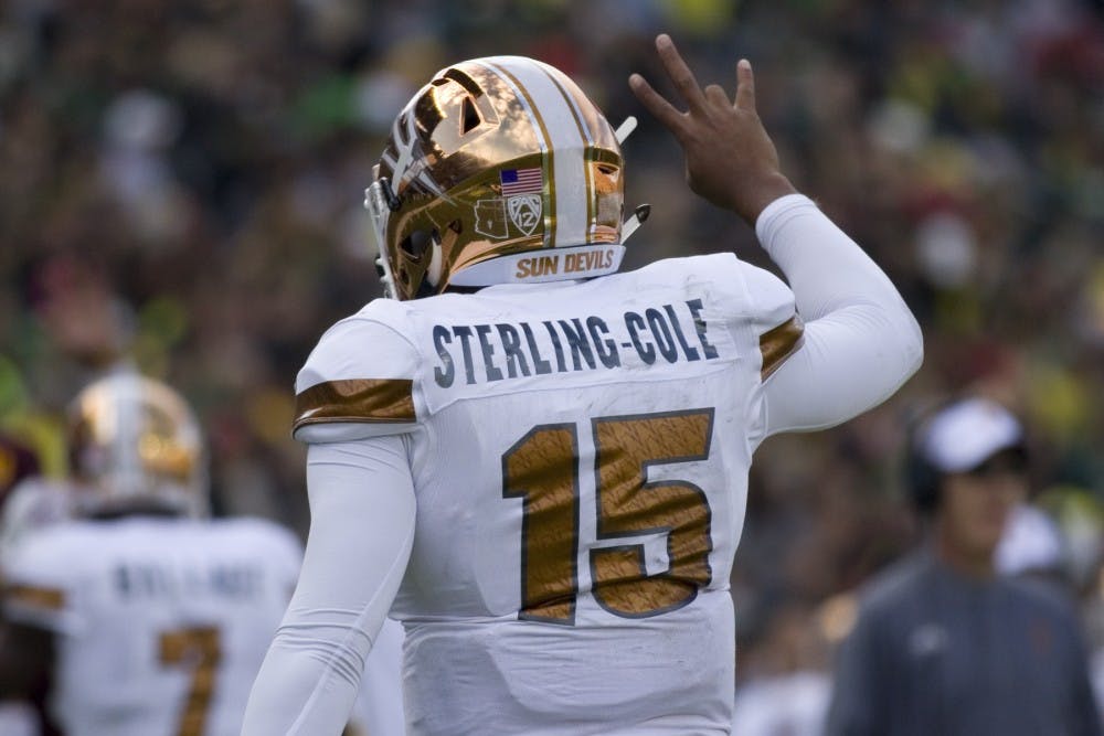 ASU freshman quarterback Dillon Sterling-Cole (15) throws up a pitchfork after scoring a rushing touchdown in the first half of a game versus the Oregon Ducks in Autzen Stadium in Eugene, Oregon on Saturday, Oct. 29, 2016. 