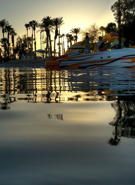 DOCKING TIME: Sun sets over Lake Havasu's marina as boaters prepare to dock for the evening. There has been a recent proposal to build an ASU campus at Lake Havasu. (Photo by MIchael Arellano)