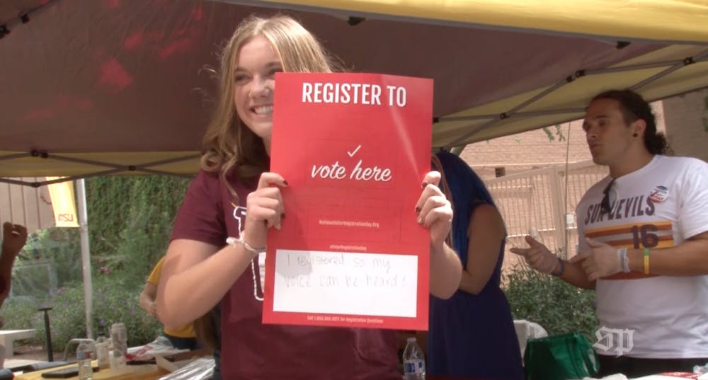 A student registers to vote on the downtown Phoenix campus.