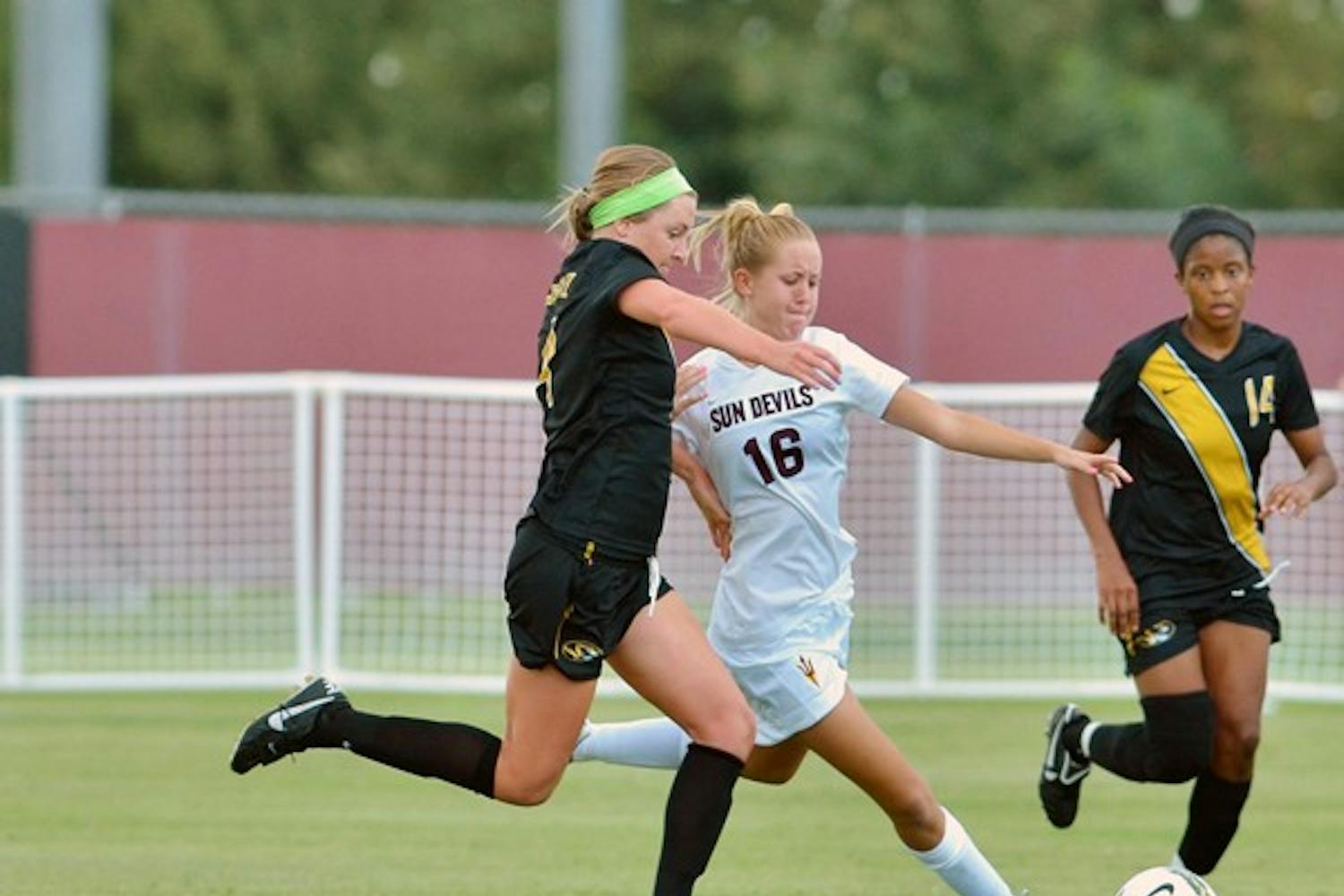 PROTECT THIS HOUSE: Sophomore midfielder Blair Alderson (16) winds up for a kick away from Missouri junior midfielder Haley Krentz during the Sun Devils’ 1-0 loss to the Tigers on Sept. 11. ASU returns to Sun Devil Soccer Stadium on Friday for the first time in 26 days for a homestand against No. 19 Oregon State and Oregon. (Photo by Aaron Lavinsky)
