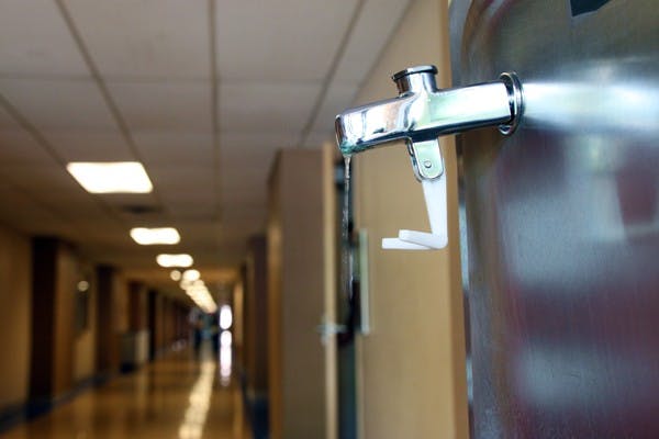 PRICE OF WATER: A leaky faucet drips in the Interdisciplinary building Wednesday afternoon. Tempe City Council is in the midst of a resolution to raise water utilities. (Photo by Rosie Gochnour)