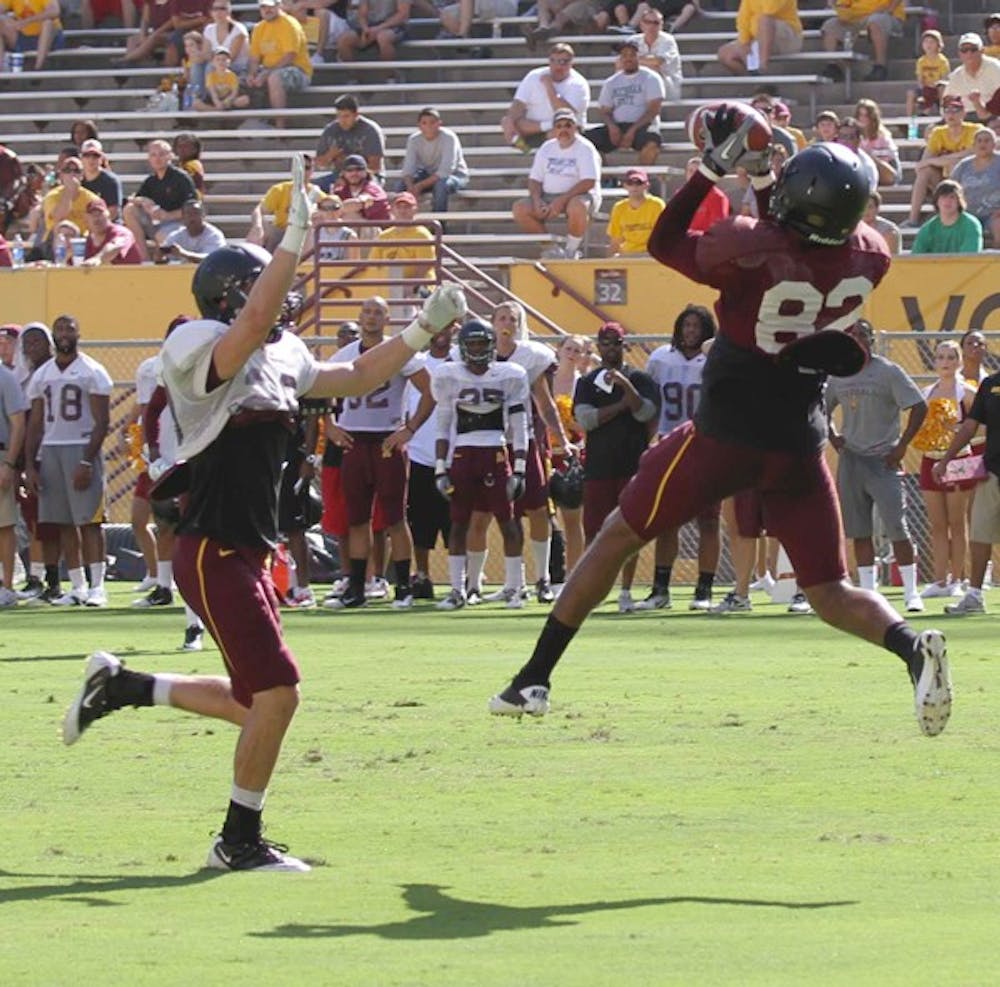 JUST PRACTICE: ASU sophomore receiver Kevin Ozier makes a leaping grab during the scrimmage on Saturday. (Photo by Lisa Bartoli)