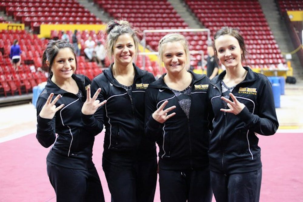 (Left to right) Natelle Gentile, Morgan Steigerwalt, Natasha Sundby and Brianna Gades pose for the camera following ASU’s loss to No. 1 Utah Feb. 12. The four freshmen have played important roles in the Sun Devils’ success this season. (Photo by Beth Easterbrook)