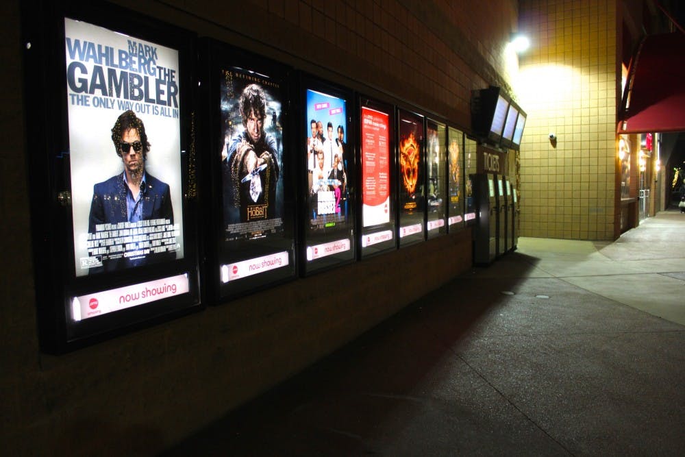 Several movie posters are placed on display in front of the Valley Art Theatre on Mill Avenue on Jan. 12, 2015. (Kat Simonovic/The State Press)
