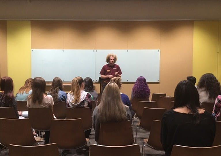 Vice President of Policy for USGD, Jimmy Arwood, speaks to students at the Tuition Town Hall on ASU's Downtown Phoenix campus.