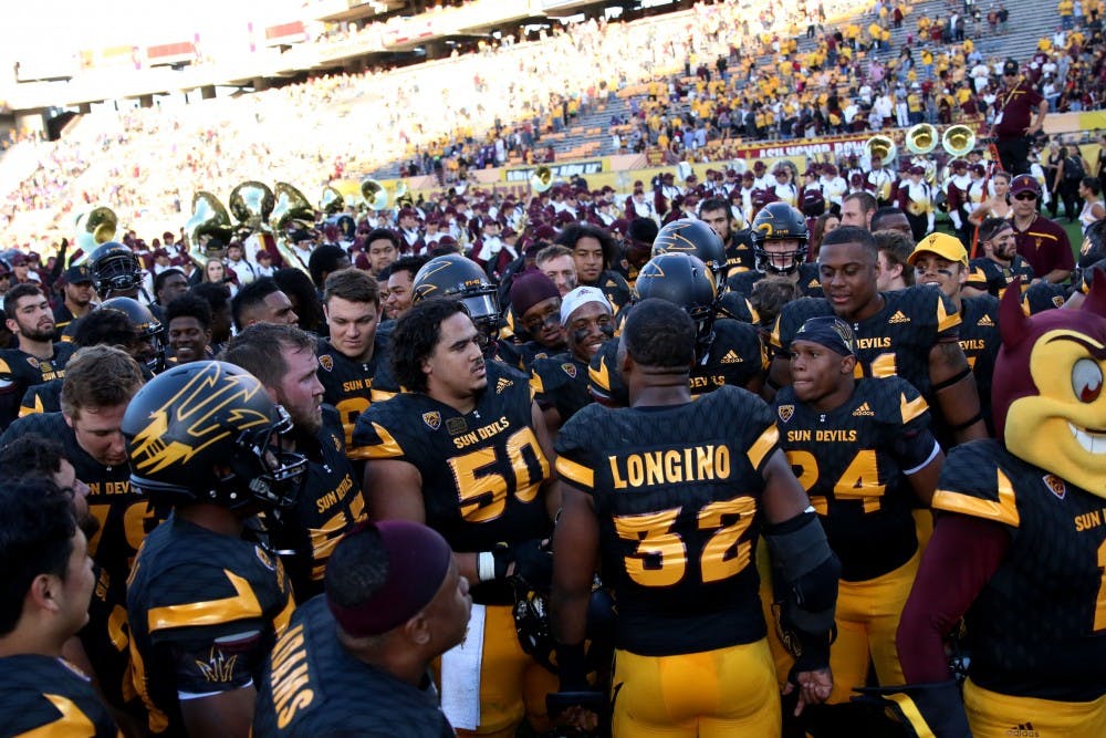ASU redshirt senior linebacker Antonio Longino gives a postgame victory speech to his team after the Sun Devils defeated the Huskies 27-17 at Sun Devil Stadium on Nov. 14, 2015.