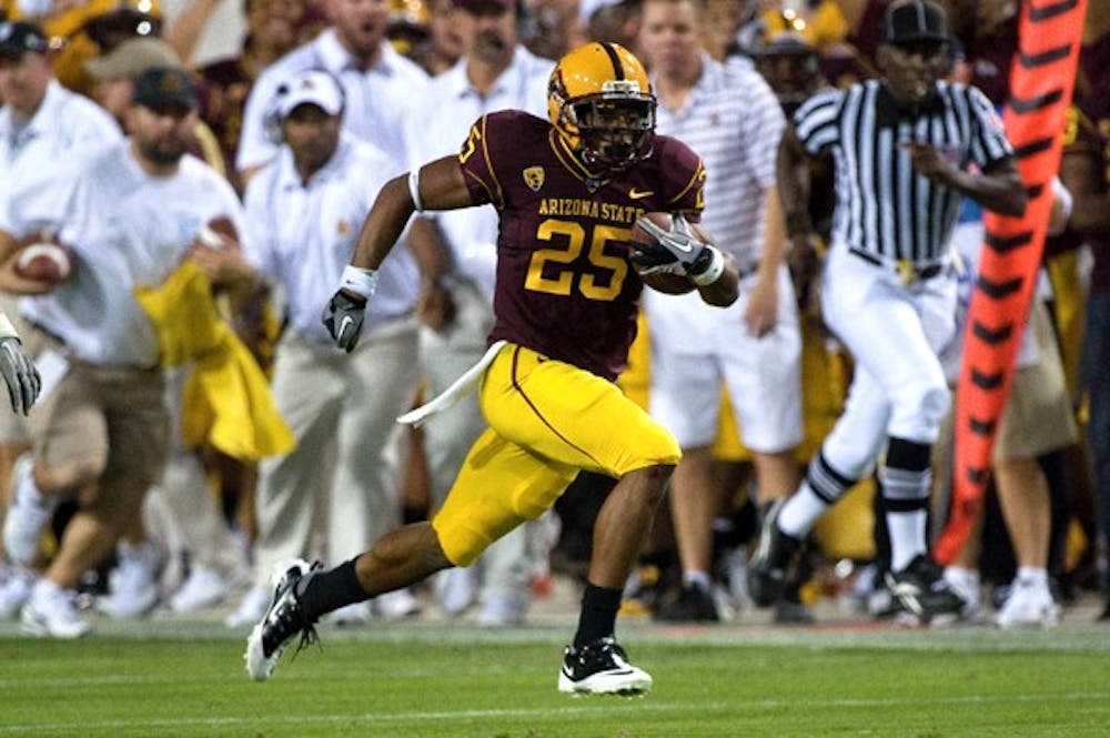 COMEBACK: ASU sophomore running back Deantre Lewis sprints with the ball in the open field in last year’s meeting with Oregon in October. Following his injury from a random shooting in February, Lewis has been fully participating in practice and is listed as questionable for Saturday’s game against USC. (Photo by Aaron Lavinsky)