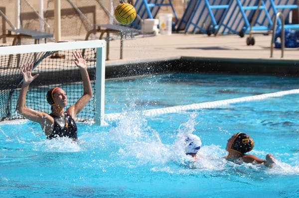 Then-Redshirt freshman goalie E.B. Keeve (left) extends to block a shot during the Sun Devils' 12-3 win over Hartwick on March 25. The Sun Devils host conference foe San Jose State in the last regular season game of the year before heading to the MPSF tournament. (Photo by Dominic Valente)