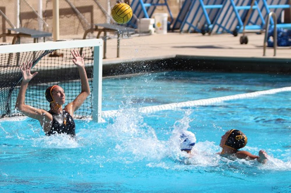Then-Redshirt freshman goalie E.B. Keeve (left) extends to block a shot during the Sun Devils' 12-3 win over Hartwick on March 25. The Sun Devils host conference foe San Jose State in the last regular season game of the year before heading to the MPSF tournament. (Photo by Dominic Valente)