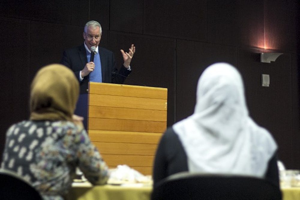 Rabbi John Linder speaks about the charity and kindness of all religions at the Muslim Student Association's annual Fast-a-Thon on Monday, Nov. 24, 2014. Linder also talked about fasting as a chosen form of repentance for past sins. (Photo by Alexis Macklin)