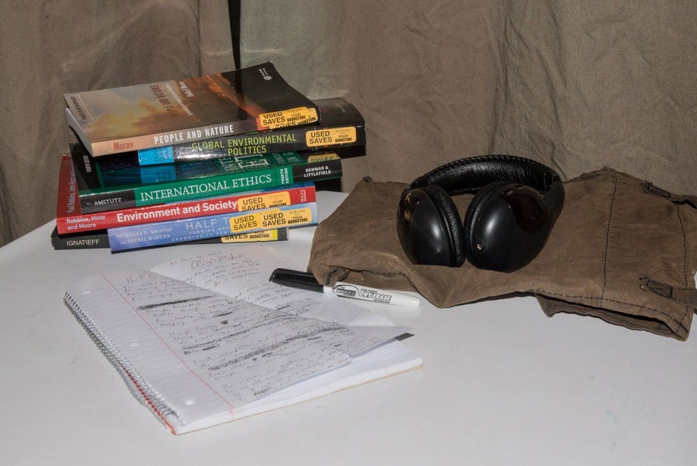 The tabletop of ASU Sustainability Junior Alex Medina waits for the student to return to read and take notes. January 19, 2015 in Tempe, AZ. (J. Bauer-Leffler/The State Press) 