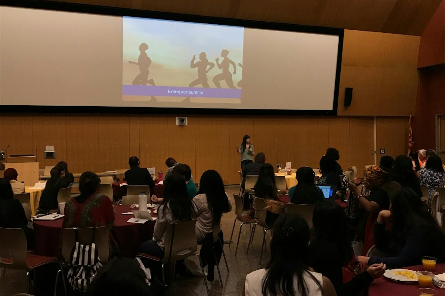 A group of listeners hearing from Laura Gomez, CEO and founder of Atipica, who delivered an inspiring talk at GateWay Community College during the Women of Color STEM Entrepreneurship Conference on Friday, March 24, 2017.