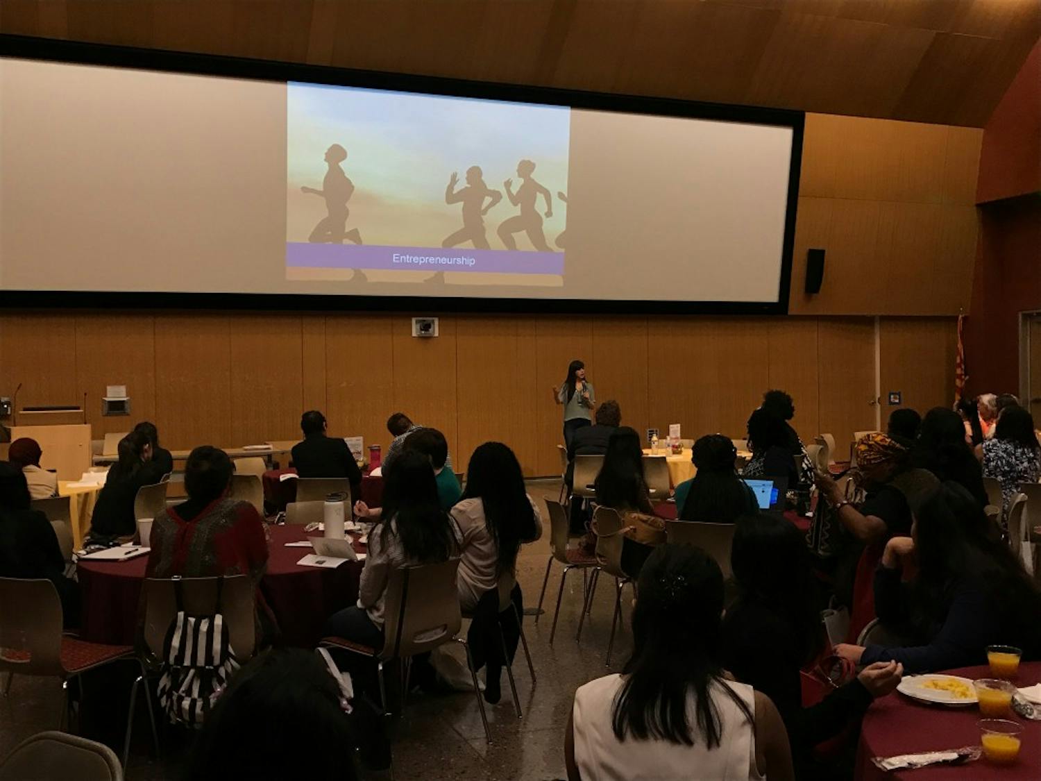 A group of listeners hearing from Laura Gomez, CEO and founder of Atipica, who delivered an inspiring talk at GateWay Community College during the Women of Color STEM Entrepreneurship Conference on Friday, March 24, 2017.