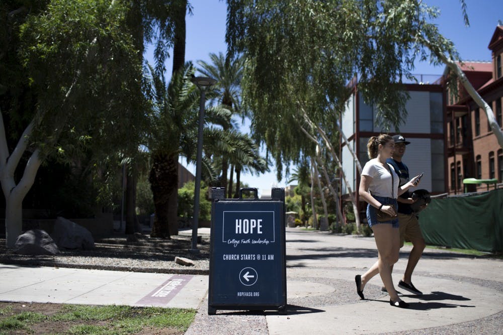 Church attendees leave a Hope Church&nbsp;service&nbsp;on Sunday, Aug. 13, 2017. Hope will soon return to Neeb Hall, where it will have to pay for space every week.&nbsp;