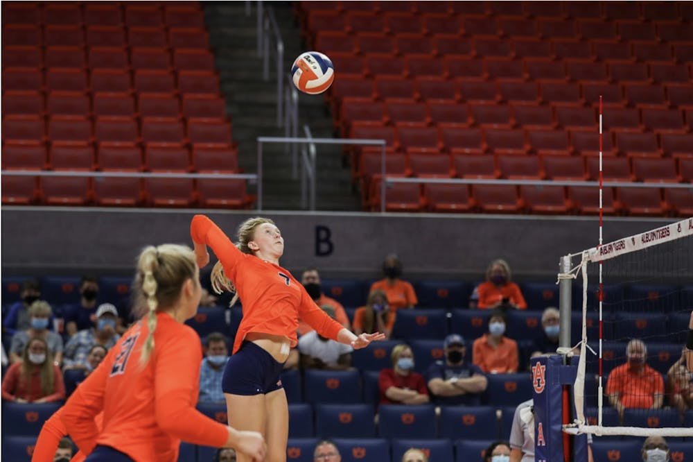 Aug 27, 2021; Auburn, AL, USA; Rebekah Rath (7) jumping to hit the ball during the game between Auburn and Tennessee Tech at Auburn Arena. Mandatory Credit: Matthew Shannon/AU Athletics