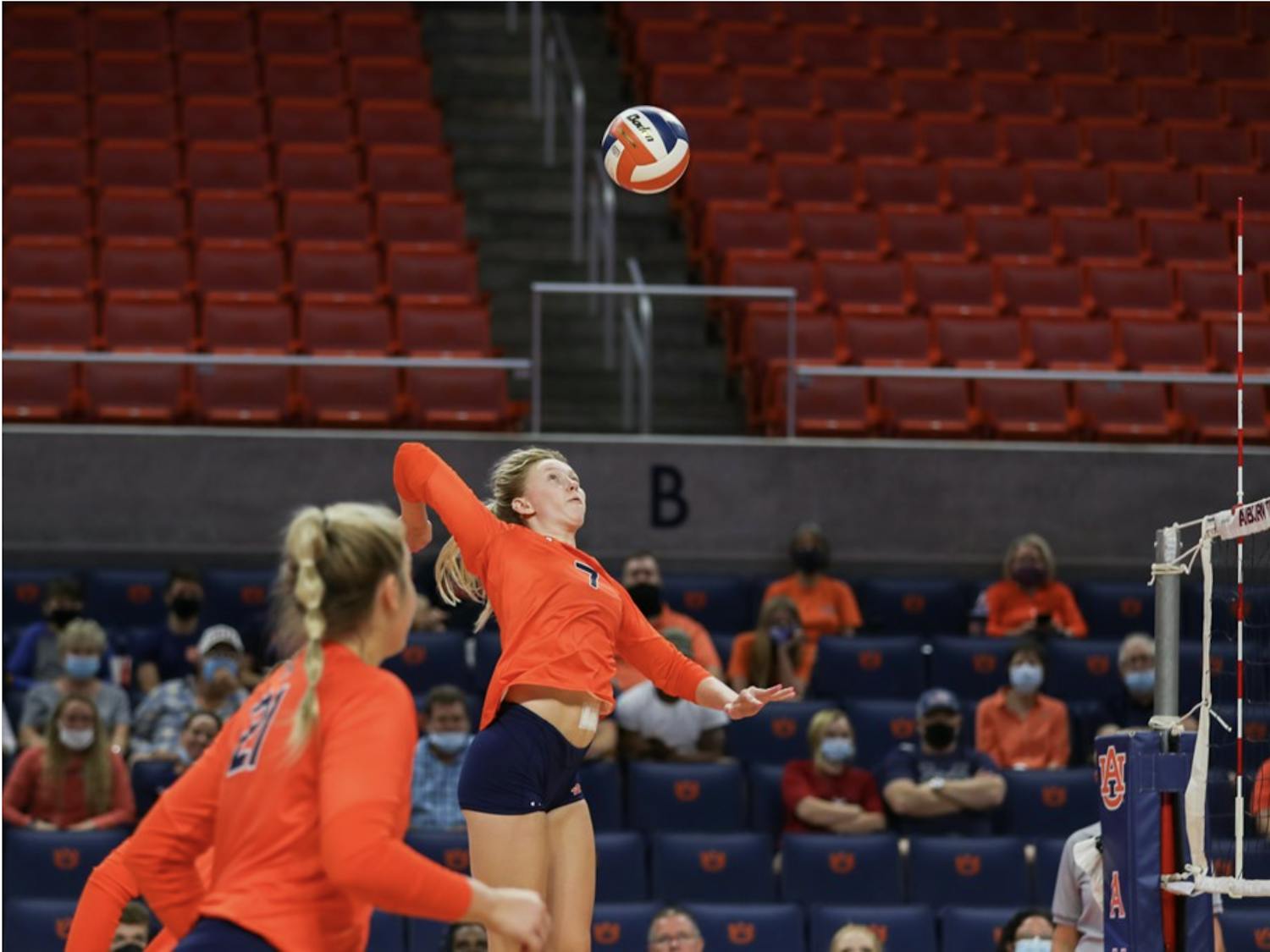 Aug 27, 2021; Auburn, AL, USA; Rebekah Rath (7) jumping to hit the ball during the game between Auburn and Tennessee Tech at Auburn Arena. Mandatory Credit: Matthew Shannon/AU Athletics
