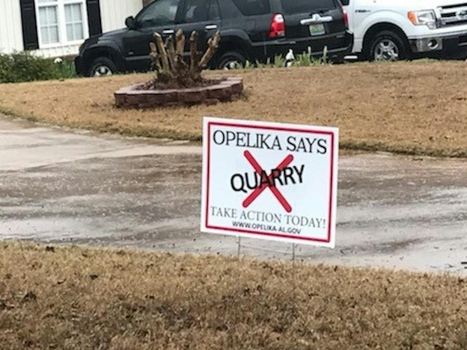 Opelika residents protest the quarry with signs up throughout neighborhoods