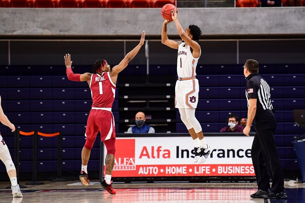 _big_123020_Auburn_SL1_2093_Jamal_Johnson_shoots_a_three_.jpg