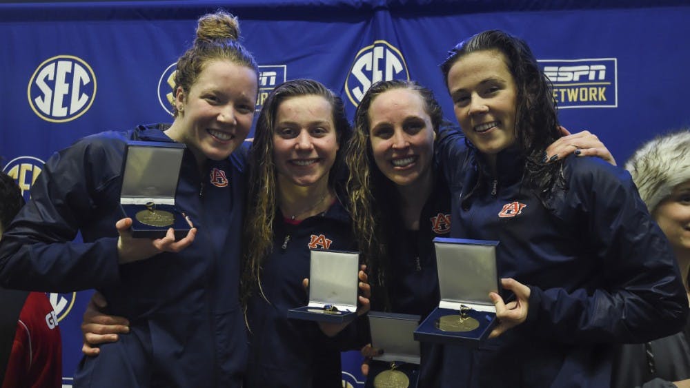Women's 400 free relay first place Auburn swimming & diving during SEC Championships on Sunday, Feb. 18, 2018, in College Station, Texas. 