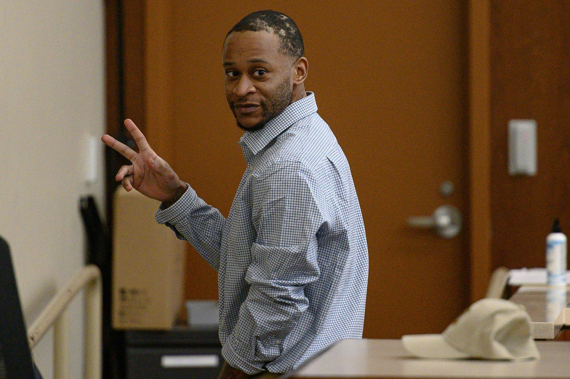 Harold Rashad Dabney III of Montgomery gestures while leaving a courtroom at the Lee County Justice Center after a preliminary hearing regarding capital murder charges on Wednesday, Oct. 15, 2025.