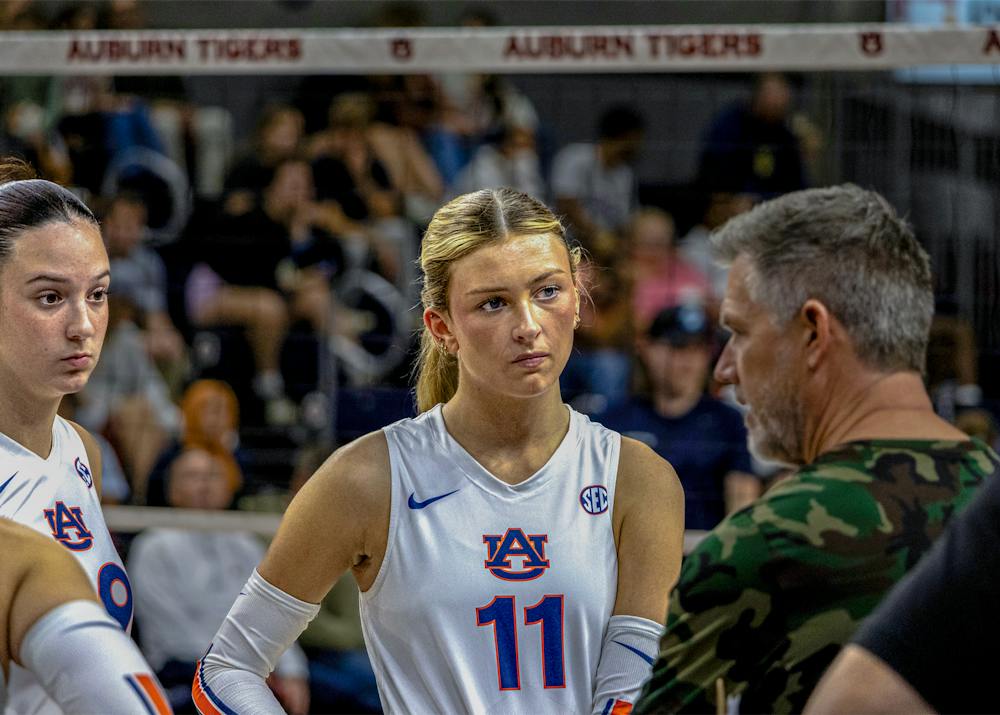 Auburn volleyball player Kate Mansfield stands near the net during a match against South Alabama at Neville Arena.