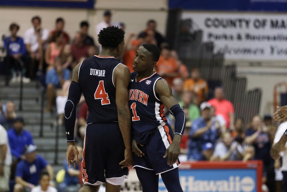Jared Harper and Malik Dunbar at the Maui Invatational