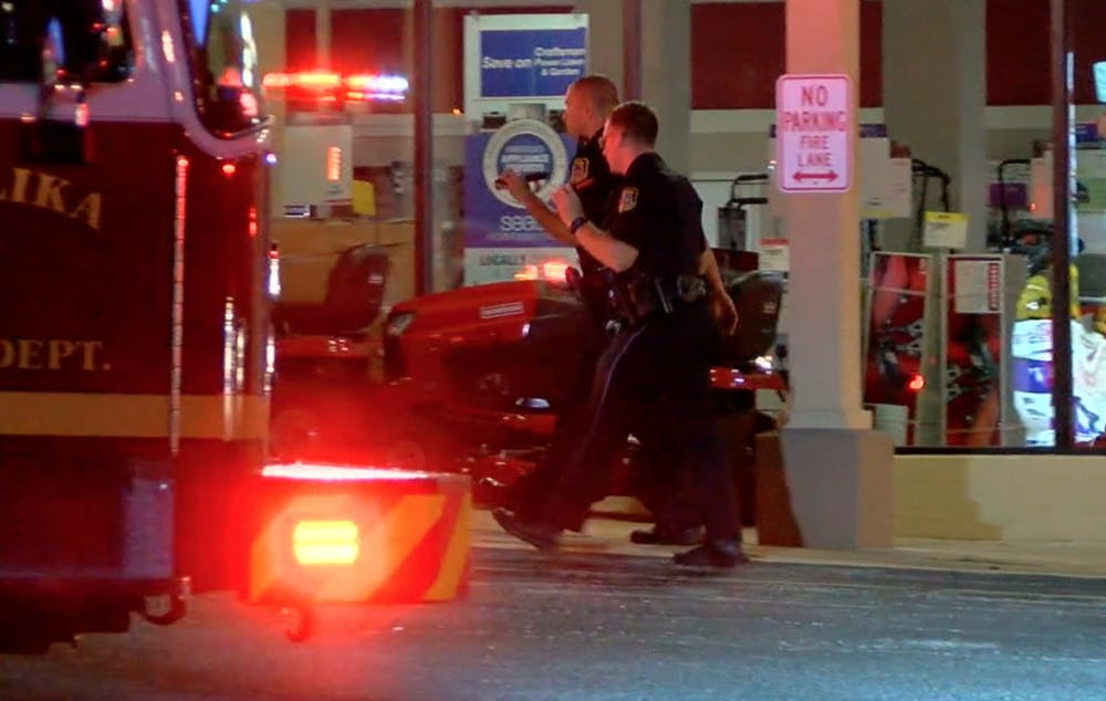 Police search for evidence at an Opelika shopping center