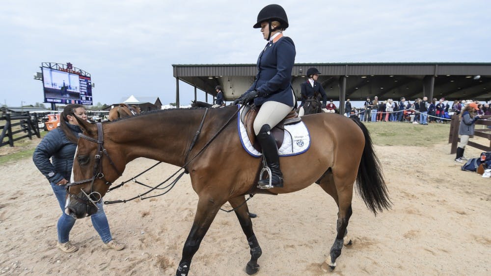 Auburn equestrian rider preparing for ride