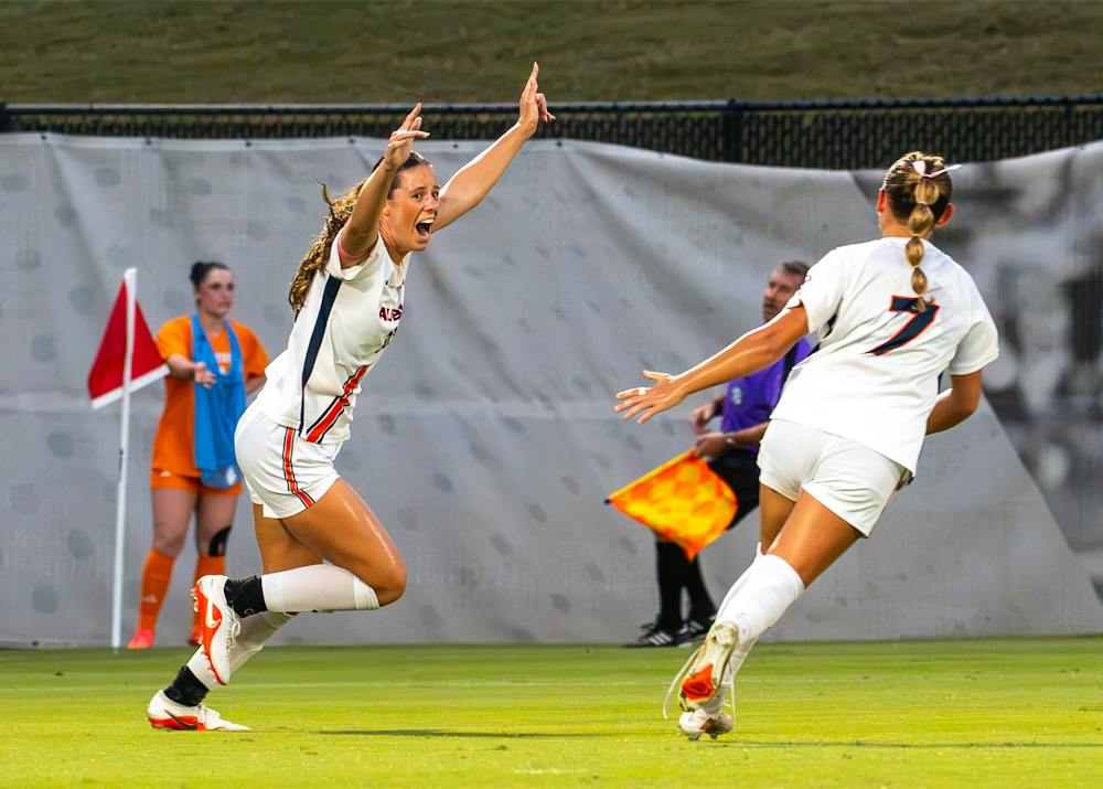 Auburn soccer’s Sylan Driver celebrates after scoring a goal against Tennessee, raising her arms as a teammate runs toward her at the Auburn Soccer Complex.