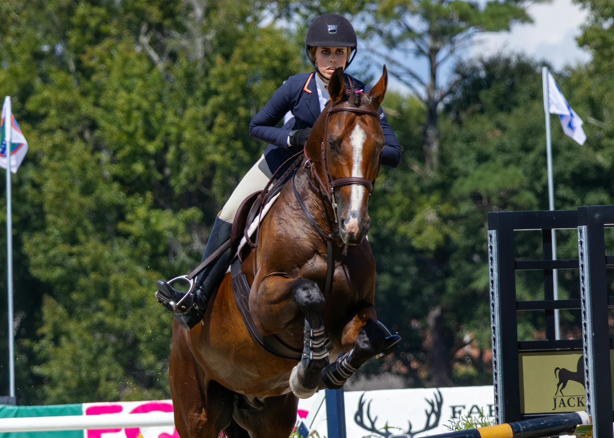 Auburn equestrian rider Avery Glynn competes on horseback during a jumping event at the Auburn University Equestrian Center.