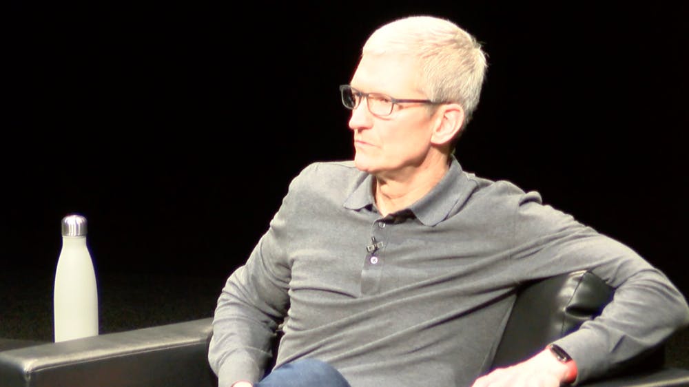 APPLE CEO TIM COOK SITTING ON STAGE