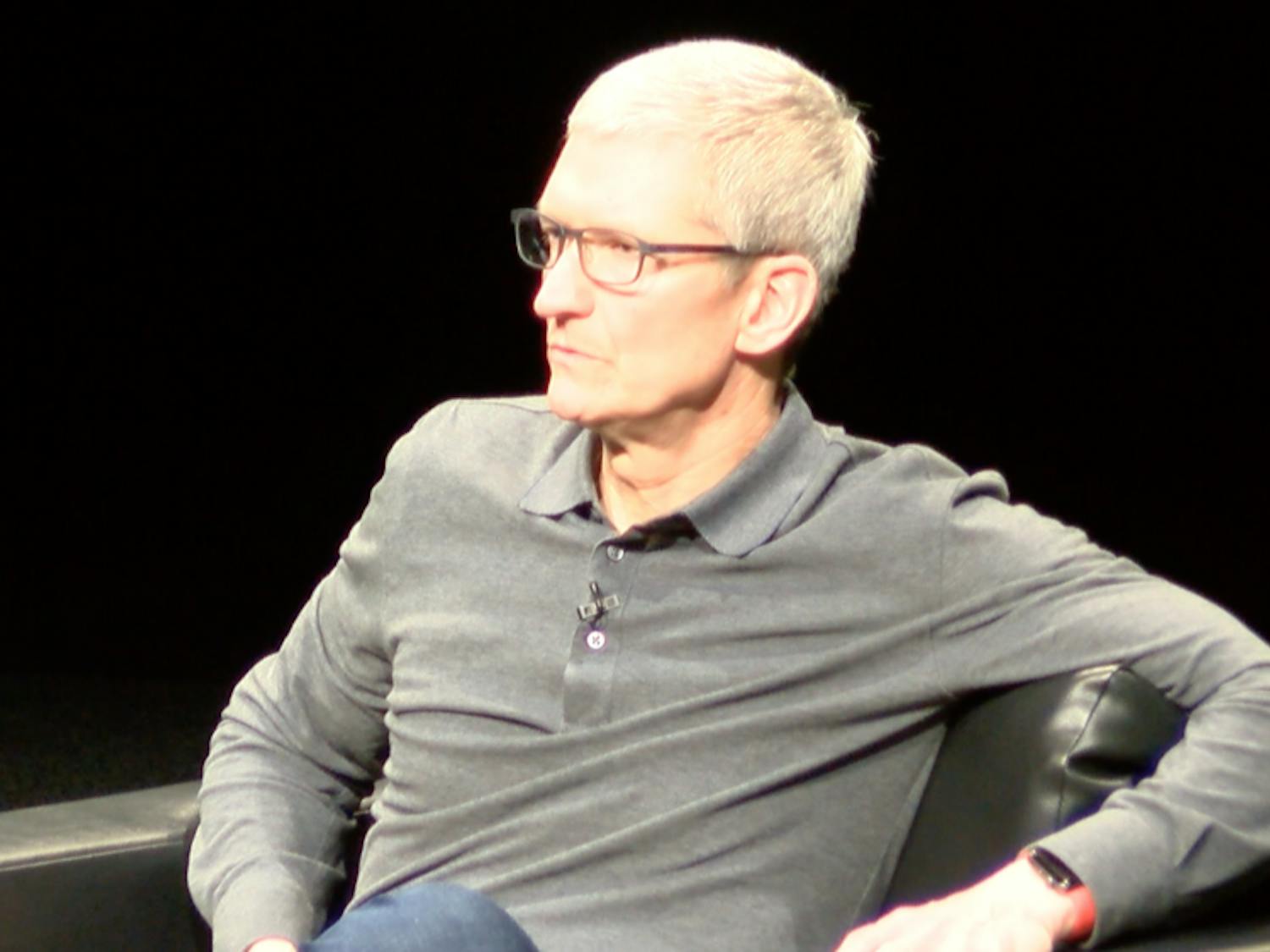 APPLE CEO TIM COOK SITTING ON STAGE