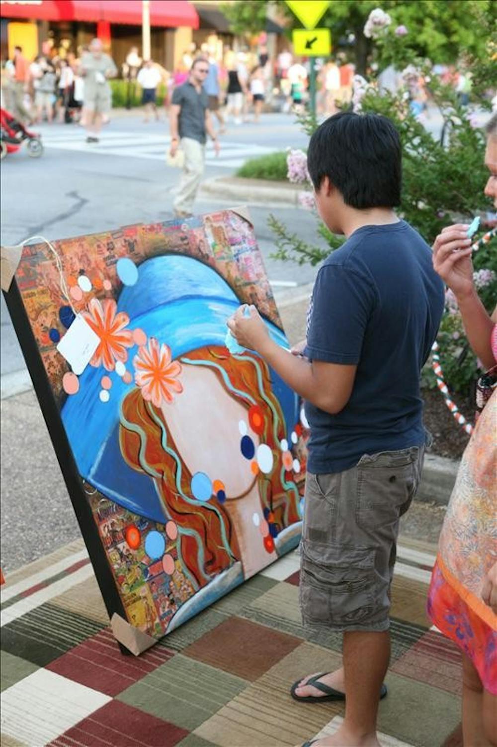 Onlookers participating in the 7th annual SummerNight's Art Walk