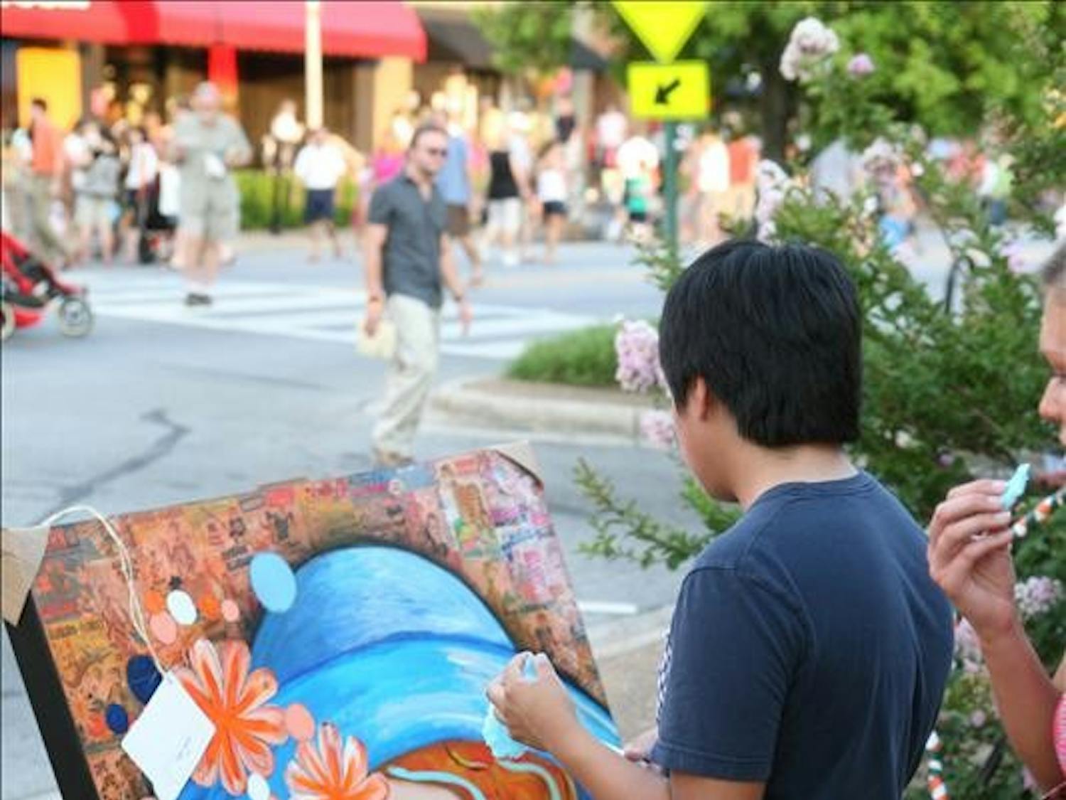 Onlookers participating in the 7th annual SummerNight's Art Walk