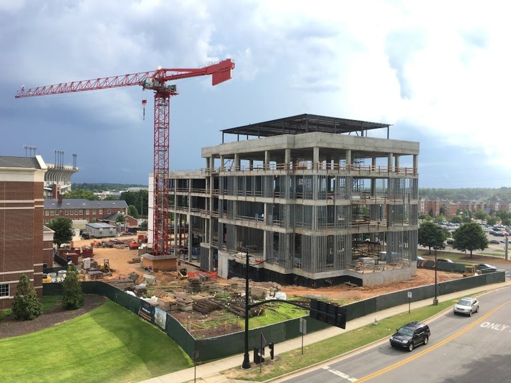 Graduate Business Building Beam Signing Marks Progress Of Constructio